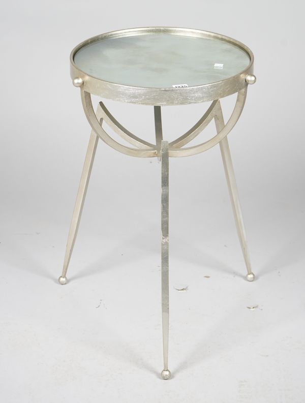 A modern silver painted metal circular occasional table, with inset mirrored top, 42cm diameter x 67cm high.