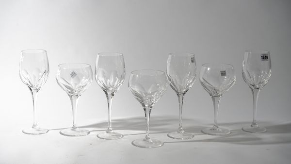 Fifteen Baccarat style crystal wine glasses, 26.5cm high, and three cocktail glasses, 22cm high, etched mark for 'Thomas Goode', (18).