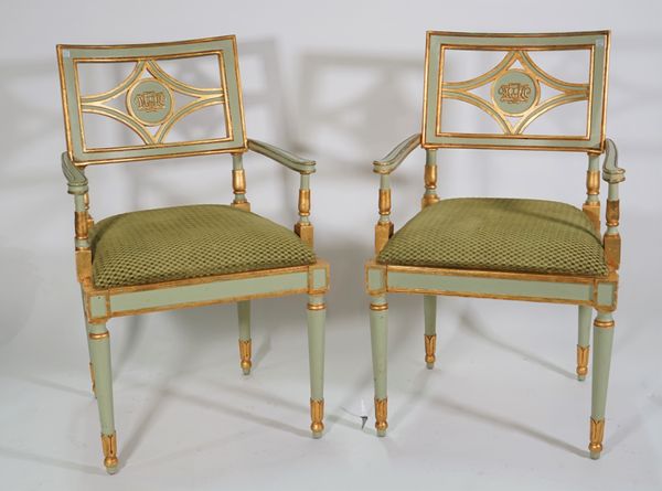 A set of six Italian cream painted and parcel gilt decorated open armchairs, with green drop-in seats, 57cm wide x 92cm high, (6).