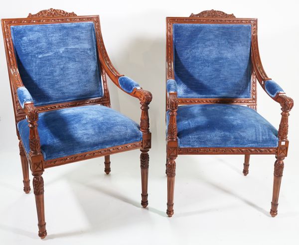 A  pair of George III style stained beech framed open armchairs, on acanthus fluted tapering supports, 62cm wide x 107cm high, (2).