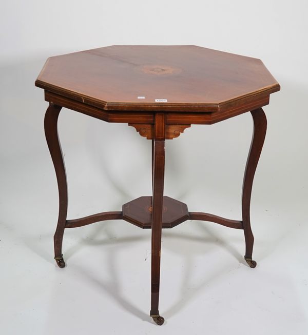 An Edwardian inlaid mahogany octagonal centre table, united by undertier, 71cm wide x 72cm high.