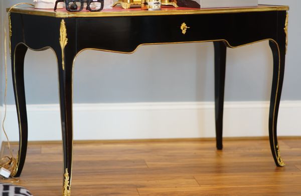 A Louis XVI style ormolu mounted, black lacquer bureau plat, with single drawer, 122cm wide x 75cm high.