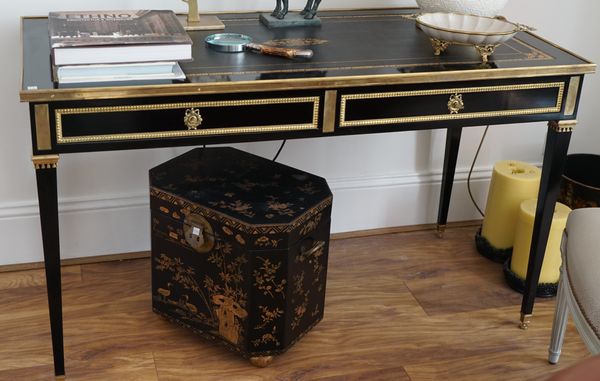 A Louis XVI style ormolu mounted, black lacquer two drawer bureau plat, 135cm wide x 78cm high.