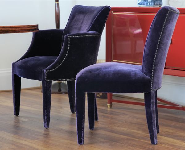 A set of eight purple upholstered dining chairs, including four carvers, 62cm wide x 86cm high, (8).