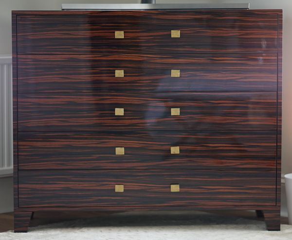 A modern coromandel chest, with five long drawers, 120cm wide x 100cm high.