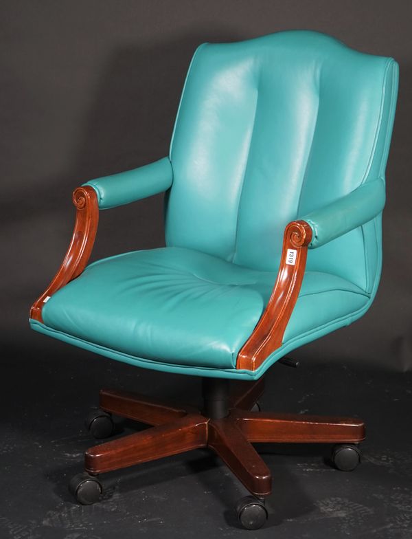 A modern office open armchair with turquoise faux leather upholstery, 64cm wide x 100cm high.