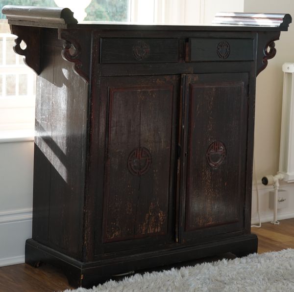 A modern South East Asian side cabinet, with two drawers over cupboard, 177cm wide x 105cm high.