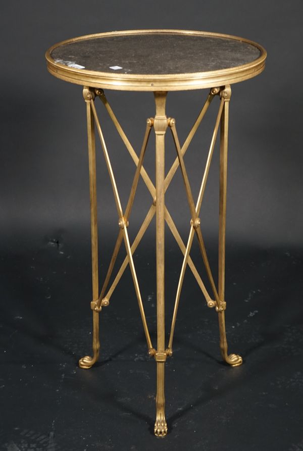 A Regency style brass circular occasional table, with inset green marble top, 41cm diameter x 71cm high.