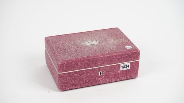 A French pink shagreen jewellery box, modern, with hinged lid and suede lined tray to the interior, indistinctly stamped, 25.5cm wide.