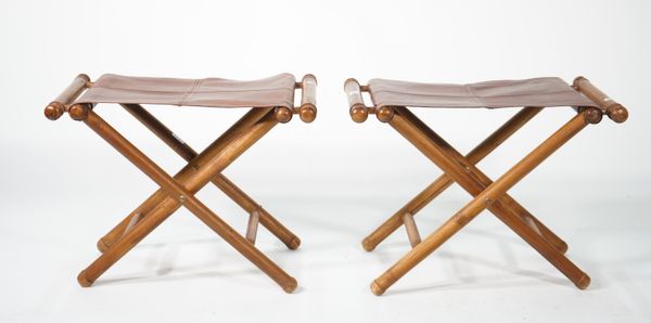 A pair of modern stained beech and leather folding 'X' frame stools, 63cm wide x 46cm high, (2).