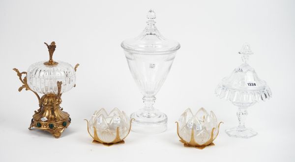 A modern Thomas Goode crystal sweetmeat vase and cover, 29cm high, an Empire style crystal vase and cover on a circular foot, 38cm high, a modern crys