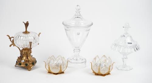 A modern Thomas Goode crystal sweetmeat vase and cover, 29cm high, an Empire style crystal vase and cover on a circular foot, 38cm high, a modern crys