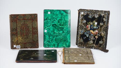 A boulle work blotter cover of rectangular form, 28.5cm x 22cm, a Victorian mother-of-pearl inlaid blotter cover and four further covers, (6).