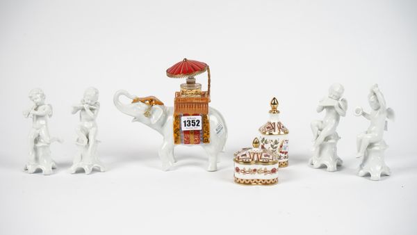 A Royal Crown Derby porcelain scent bottle and stopper decorated in the 'Honeysuckle' pattern, 11cm high, a matching box and cover, a Limoges porcelai