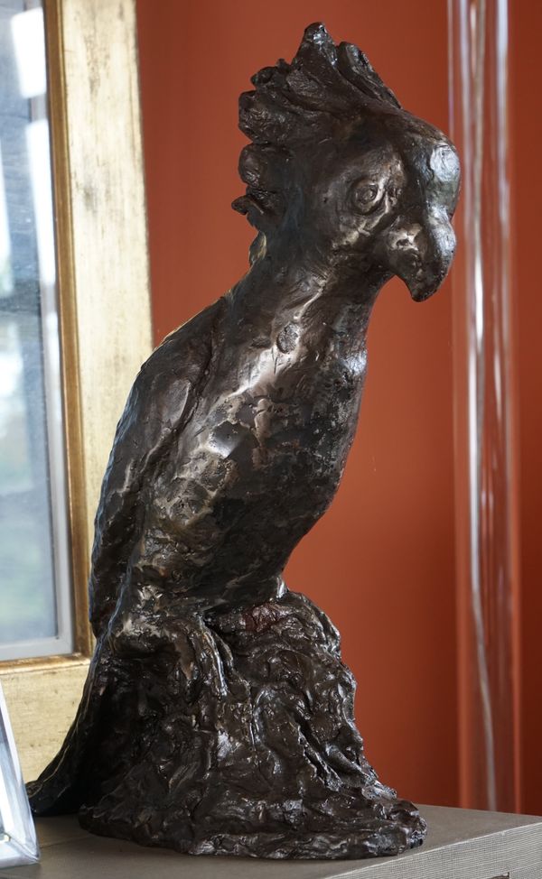 A modern faux bronze model of a parrot, 53cm high.