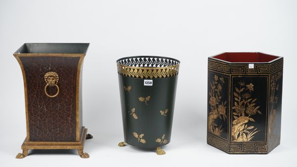 A Regency style tole peinte waste bin of pierced circular form with gilt oak leaf decoration, against a green ground, 35cm high, and two further waste