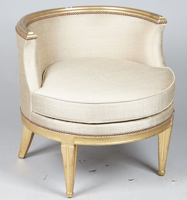 A modern giltwood tub chair, with cream upholstery, 67cm wide x 66cm high.