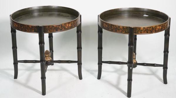 A pair of composite circular low occasional tables, 48cm diameter.