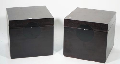 A pair of modern ebonised lift top boxes of cube form, 44cm wide x 42cm high, (2).
