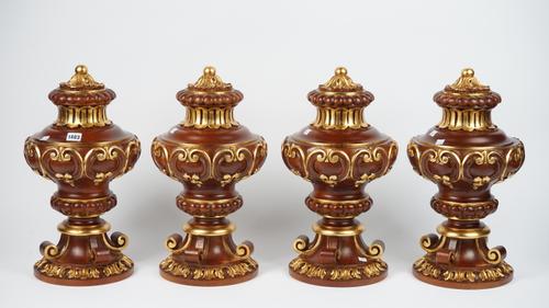 A set of four giltwood finials with acanthus carved decoration against an urn form body, 46cm high, (4).