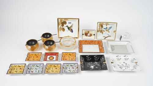 A collection of modern porcelain, crystal and metal ashtrays including Limoges, (qty).