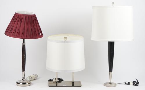 A modern polished steel table lamp of rectangular sectional form, 30.5cm wide, a 'Boyd' hardwood and silver plated table lamp of tapering cylindrical