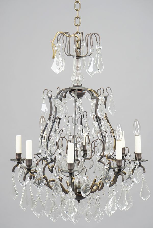 A pair of brass and glass cage chandeliers in the Louis XV style, approximately 90cm high.