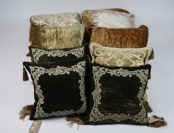 A group of ten cushions, varying green velvets and designs, (10).