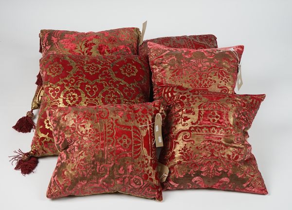 A group of six velvet maroon and gold patterned cushions, (6).