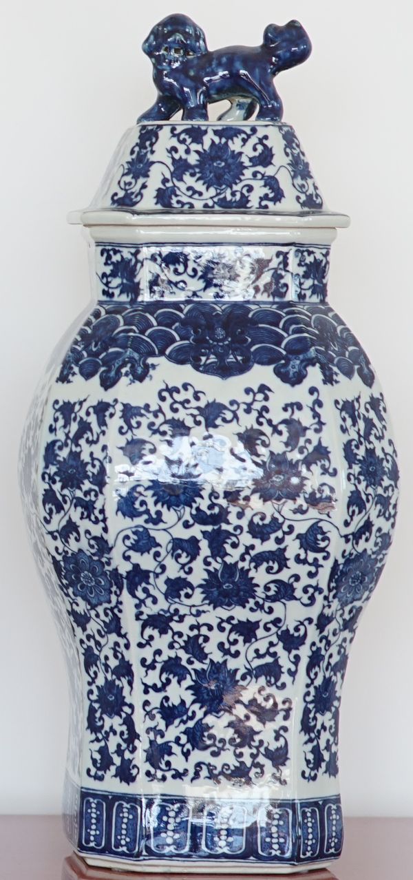 A pair of modern blue and white octagonal baluster vases and covers, 60cm high, (2).