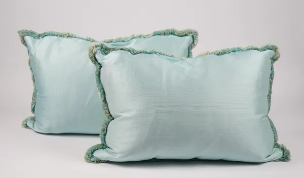 Two silk aqua tasselled cushions, a pair of velvet aqua cushion and a group of six blue and white patterned cushions, (10).