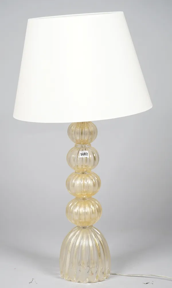 A Murano style glass lamp, formed as six graduating balls, 87cm high.