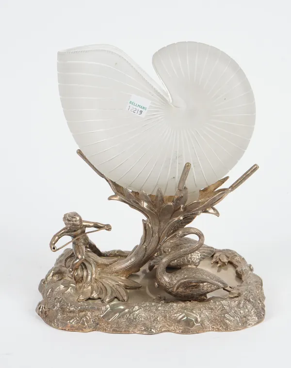 A silver plated centrepiece, applied with two cast models of swans and a cherub, on a naturalistic rocky base, fitted with a frosted glass dish, forme