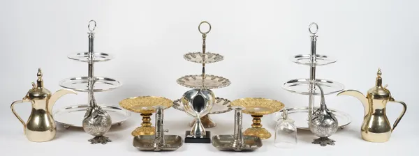 A large quantity of silver plated wares, comprising; three cake stands, various table place mats, a pair of chambersticks, crumb scoops and further gi