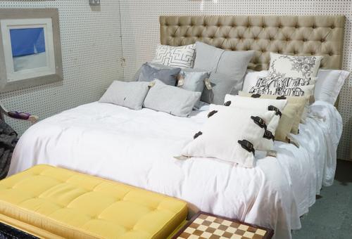 A modern upholstered large double bed with headboard, mattress and divan, the headboard 207cm wide.