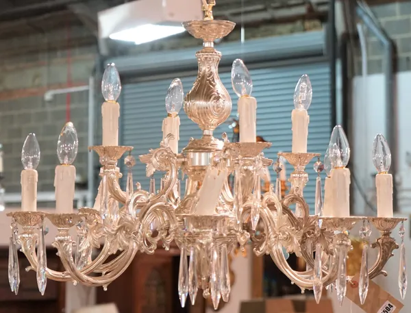 A Victorian style silvered metal twelve branch chandelier with glass drops, 63cm wide.