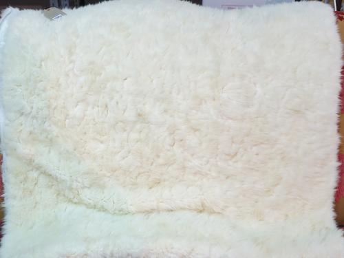 A Bagnaresi Casa white fur throw, 102cm x 197cm.