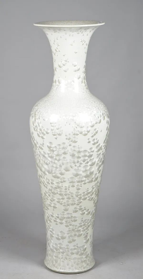 A large modern white glazed Chinese baluster vase, 135cm high.