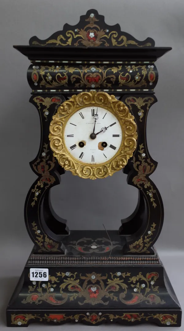 A French boulle work portico mantel clock, late 19th century, the white enamel dial detailed 'J. BRIGHT PARIS', the drum held aloft by four shaped sup