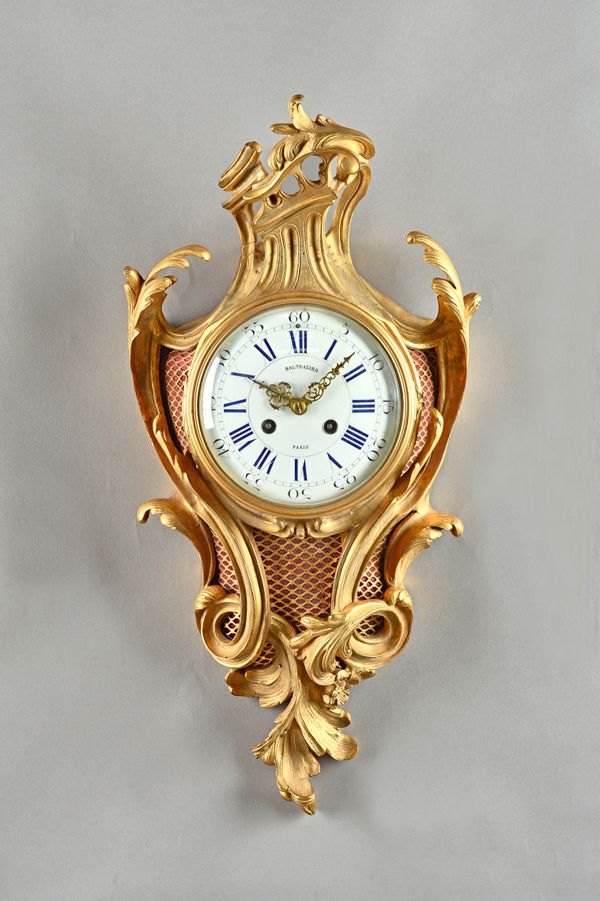 A French ormolu Cartel clock, late 19th century, the 5.5 inch enamel dial detailed 'Balthazard Paris', enclosing a two train movement with count wheel