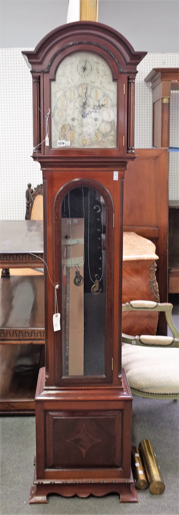 An Edwardian mahogany Westminster/Whittington twin train quarter-chiming longcase clockRetailed by David Wilson, Aberdeen, circa 1910The pediment with