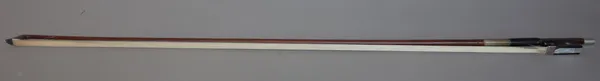 A French violin bow with silver mounts, indistinctly stamped 'xxxxxxx A Paris', 74cm, 57.8 grams.