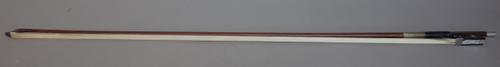 A French violin bow with silver mounts, indistinctly stamped 'xxxxxxx A Paris', 74cm, 57.8 grams.