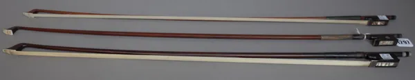 Two Continental violin bows with silver mounts, 74.5cm, 56.3 grams & 74.6cm, 61 grams and a cello bow with silver mounts, 71cm, 74.9 grams, (3).