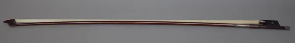 A French viola bow with silver mounts, indistinctly stamped 'xxxxx A Paris', 74cm, 70.6 grams.