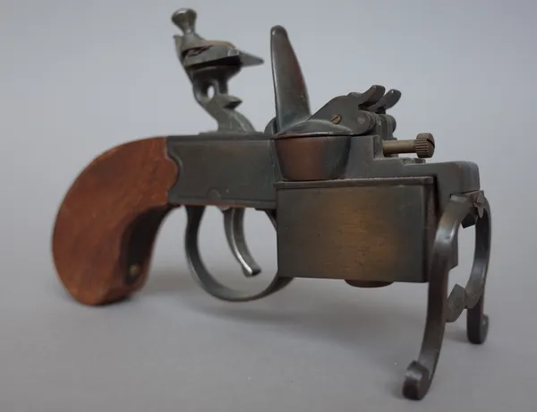 A Dunhill novelty 'Tinder Pistol' table lighter, 15cm wide.