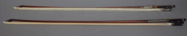 A German viola bow with silver mounts, indistinctly stamped 'xxxxx A Dresden', 71.5cm, weight 72.3 grams and another unsigned viola bow with silver mo