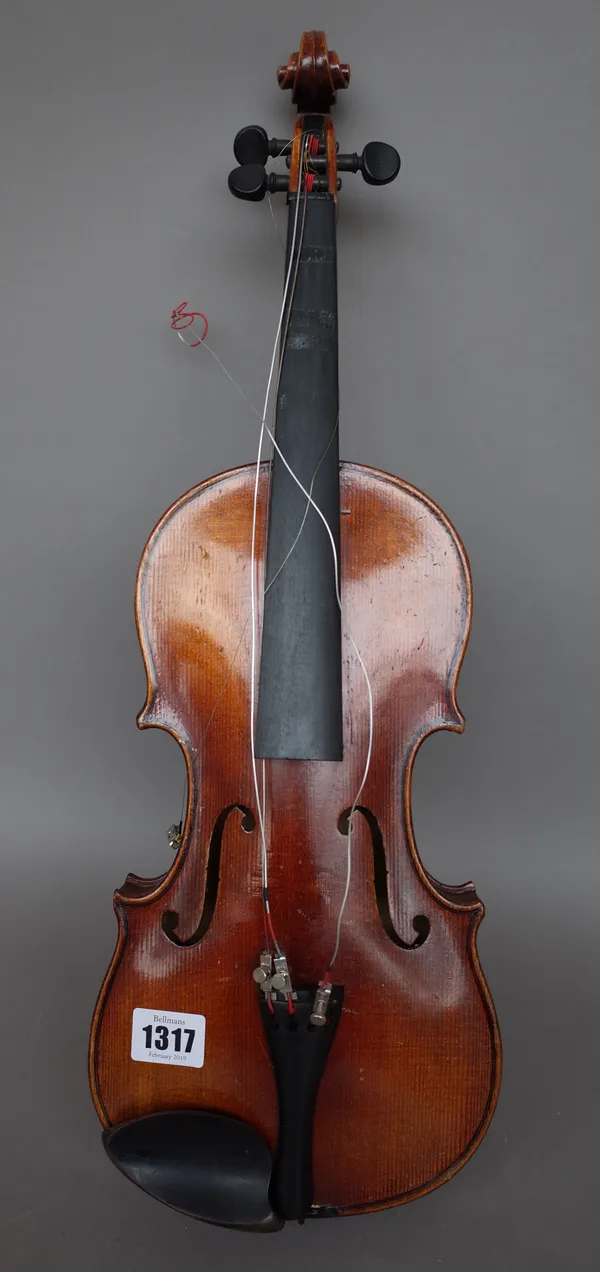 A half size violin, lacking interior label, back measures 12.5 inches with one bow and hardcase.