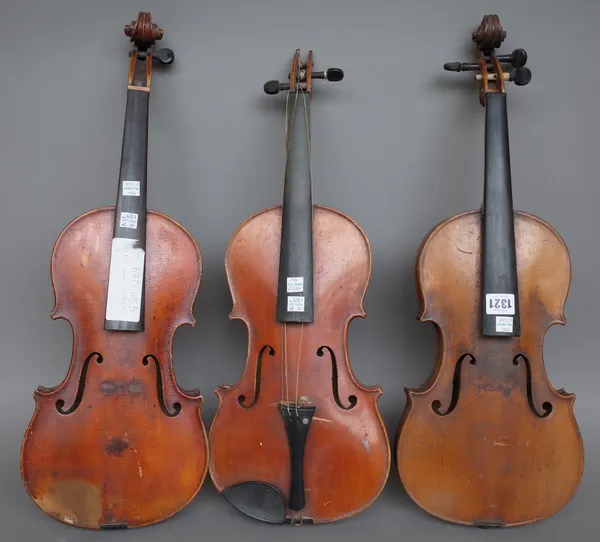 Three Continental violins, one with indistinct paper label 'xxxxx Duicis Et Fortis', back measures 14 1/8inches, (a.f.), (3).