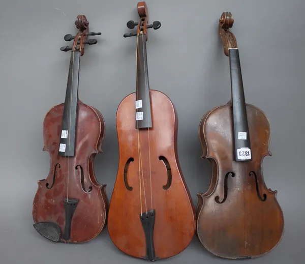 An Italian violin with interior paper label detailed 'Antonius Stradivarius 1721' back measures 14 1/8 inches and two further violins, (a.f) (3).